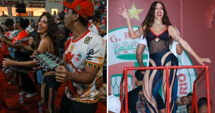 Anitta toca chocalho e samba com look transparente em ensaio da Grande Rio